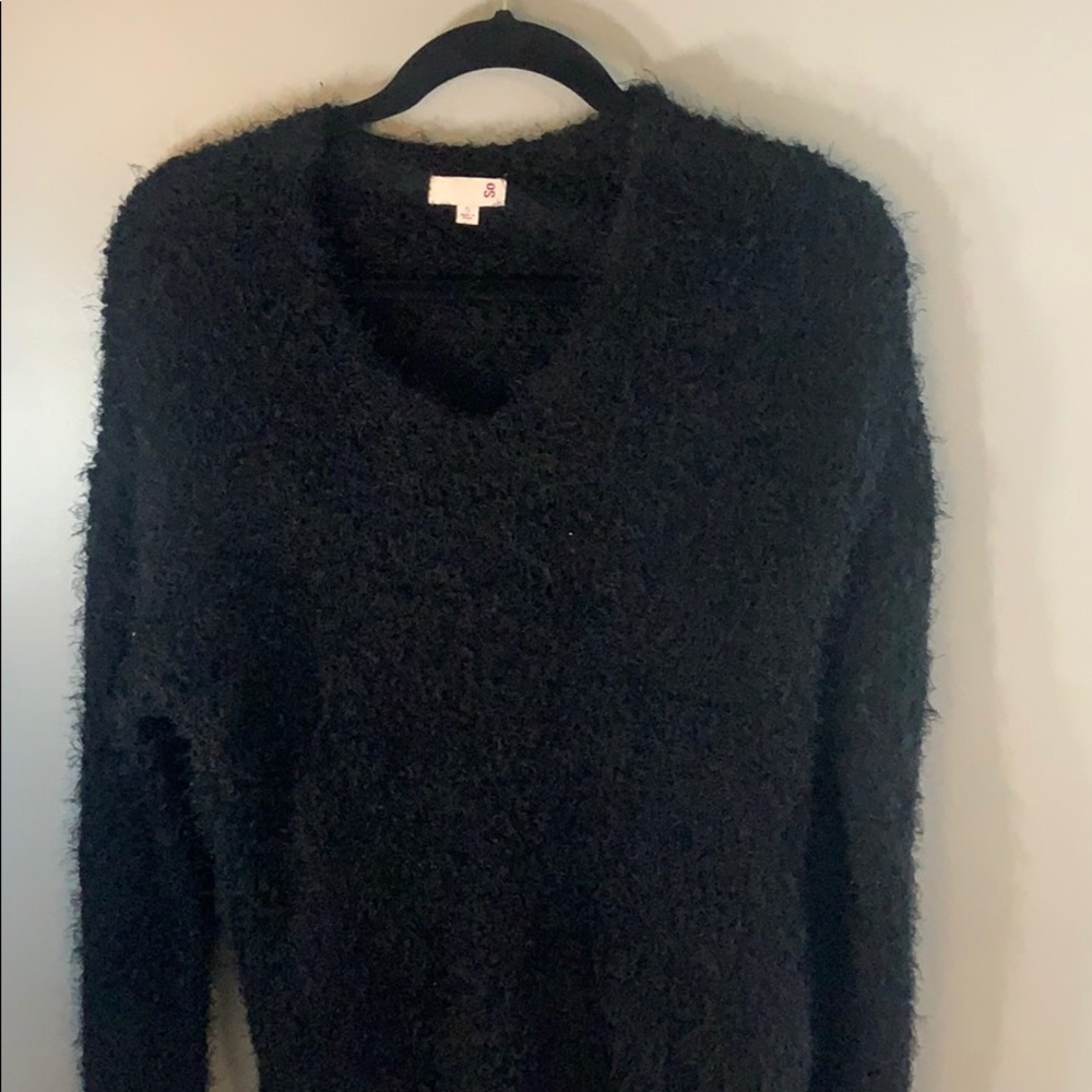 black fluffy sweater